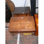 An old rope handled box, together with a lectern w