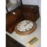 Two old sewing machines and a wall clock