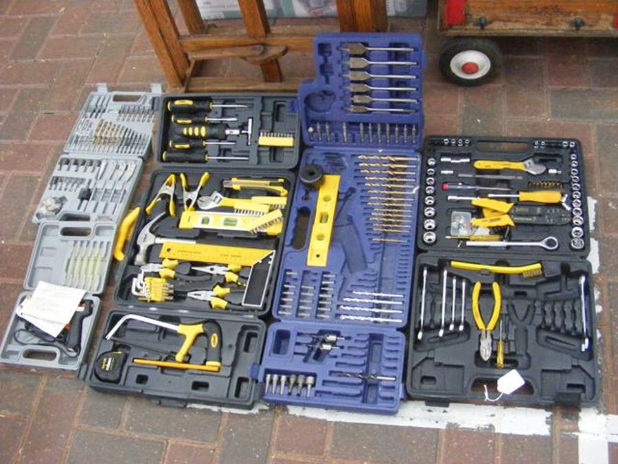 A quantity of drill bits, spanners and other tools