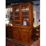 A 19th century bookcase with glazed upper section,