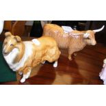 A Beswick Highland Cow ornament together with dog