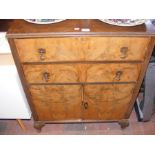 A walnut veneered utility cupboard - width 77cm