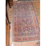 A Middle Eastern rug with geometric border - 150cm