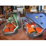 Two violins in cases