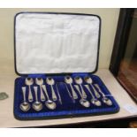 A cased set of twelves silver teaspoons with sugar