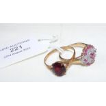 A red stone 9ct dress ring together with one other