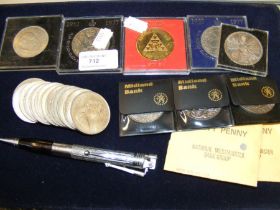 Various collectable coins together with a Ronson lighter pen