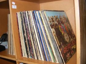 Assorted 12 inch vinyl records, including The Beat