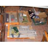 Various boxes containing model railway accessories