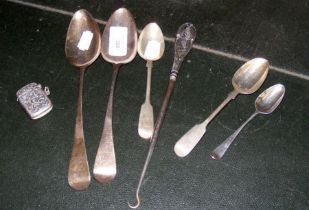 Silver serving spoons, vesta case