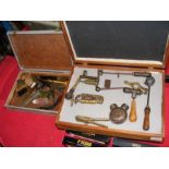 A collection of antique ammunition making tools