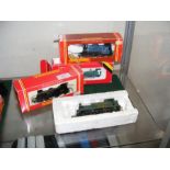 Three boxed Hornby 00 gauge locomotives together w