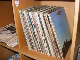 A quantity of 12 inch vinyl records, including The
