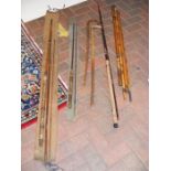 Antique fishing rods, walking stick