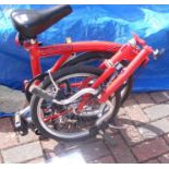 A Brompton 2005 folding bicycle