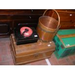 A vintage metal trunk, copper bucket, lock box and
