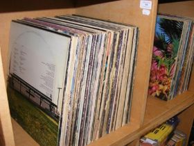 A quantity of 12 inch vinyl records, including Van Morrison