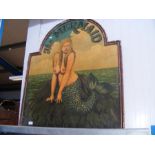 A reproduction mermaid advertising sign