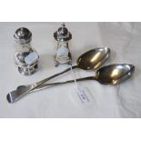 A pair of silver serving spoons with London hallma