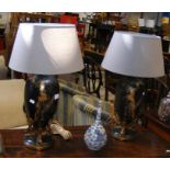 A pair of decorative antique style table lamps wit