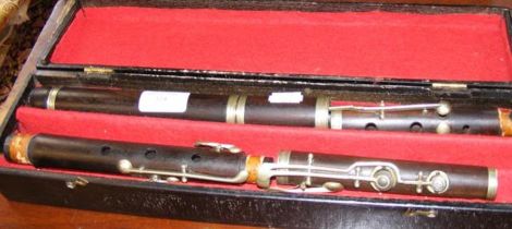 An old wooden flute in carrying case