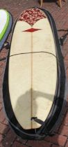 A Chapters surfboard 9ft 6 longboard with case and