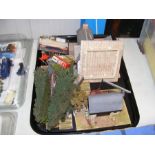 A tray of model railway buildings and accessories