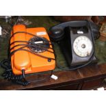 A vintage Siemens orange telephone and one other