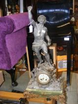 A French 'E. Lefort' mantel clock with statuette