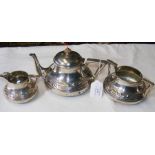 A three piece silver tea set - London 1902 - with m