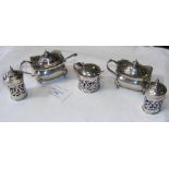 A selection of silver mustard pots, pepperettes -