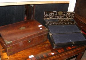 A 19th century ebony writing slope together with o