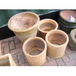 Four terracotta plant pots - varying sizes