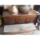 A panelled oak coffer with carved decoration - 128