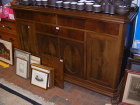 A large dining room sideboard on claw feet - width