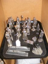 A quantity of cast metal figurines