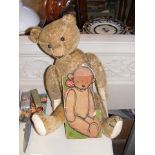 An early 20th century Teddy Bear, together with 'T