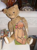 An early 20th century Teddy Bear, together with 'T