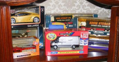 A quantity of boxed die cast model vehicles, inclu