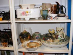 Assorted serving ware - on two shelves