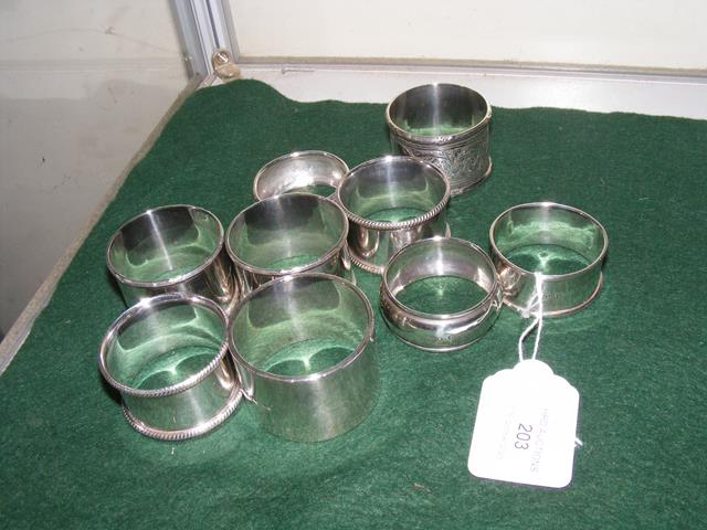 A selection of silver napkin rings etc