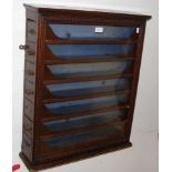 An unusual Victorian seven drawer wall mounted dis