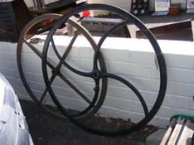 Two large metal wheels