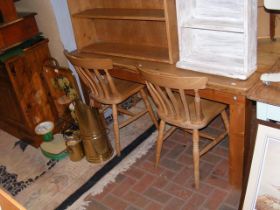 A pine farmhouse kitchen table, together with four