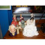 Five Royal Doulton female figurines and a John Dou