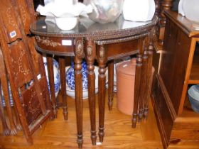 A French style nest of three occasional tables