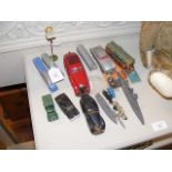 A collection of vintage toy cars, including Schuco