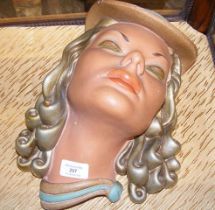 An Art Deco painted earthenware wall mask of Vicky