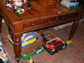 A Victorian partners desk with drawers to the apro