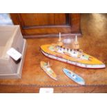 A model steam ship together with two others